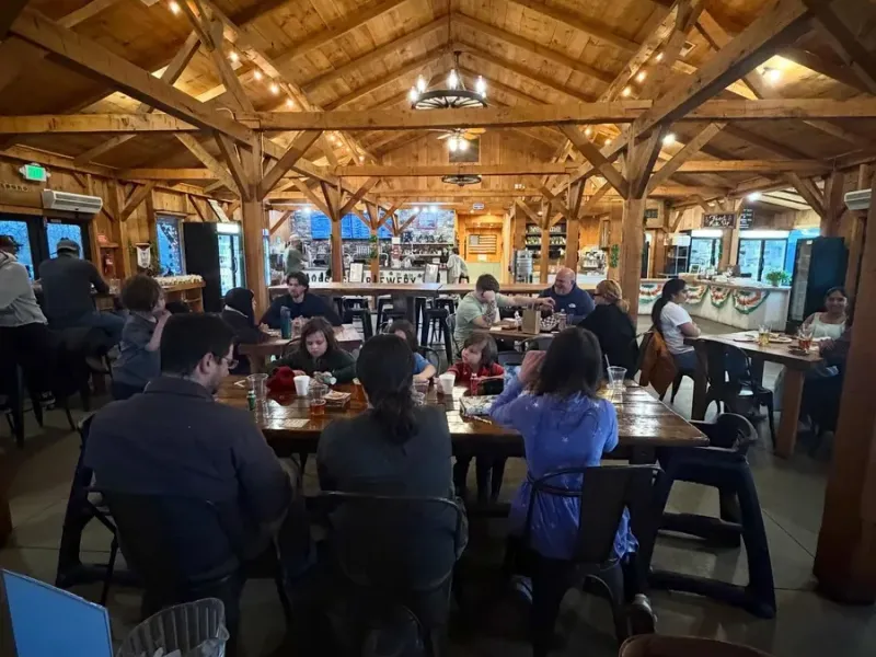 Harvest Gap Farm Brewery timber-framed taproom with guests