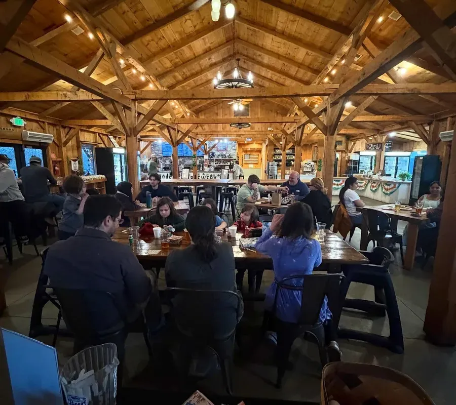 Harvest Gap Farm Brewery timber-framed taproom with guests