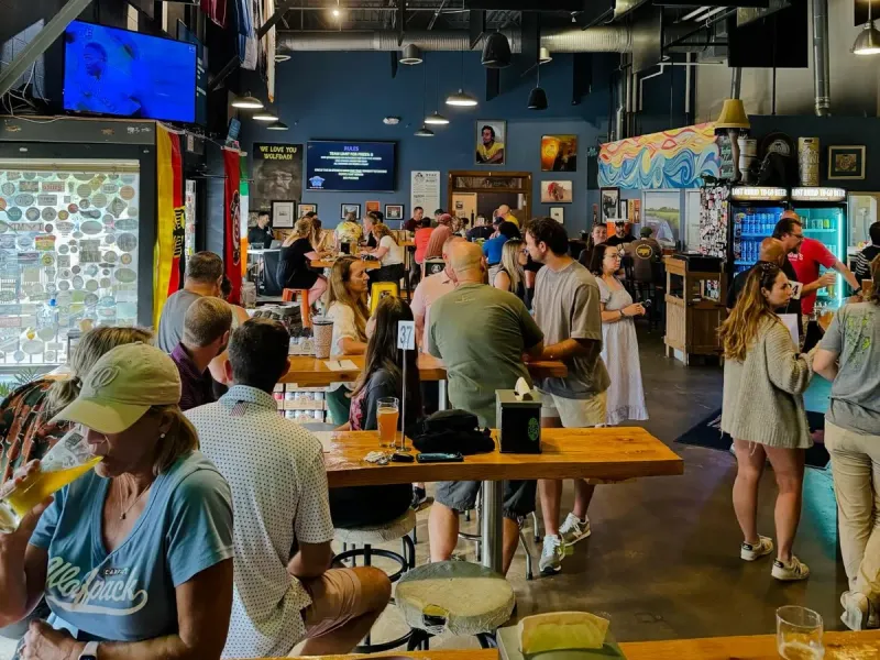 Lost Rhino Brewing Company taproom filled with guests