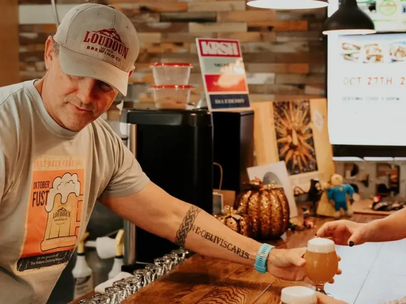 Loudoun Brewing Company bartender pouring beers at the bar