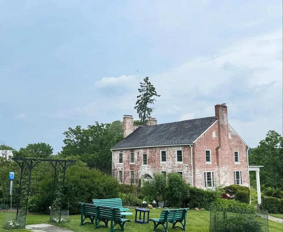 Zephaniah Farm Vineyard brick manor house and garden seating